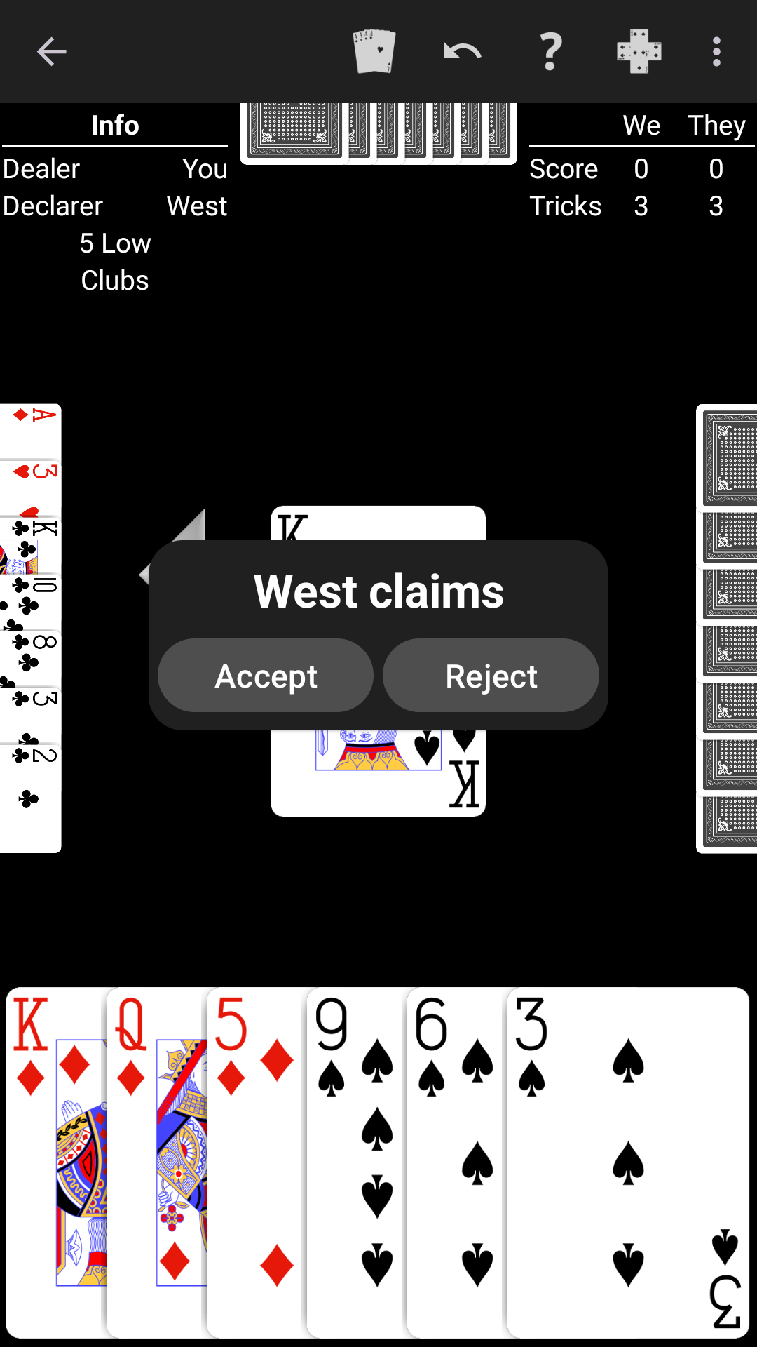 Bid Whist played on a high-contrast black table