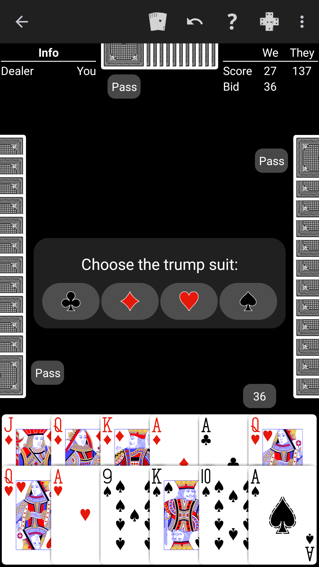 Pinochle played on a high-contrast black table